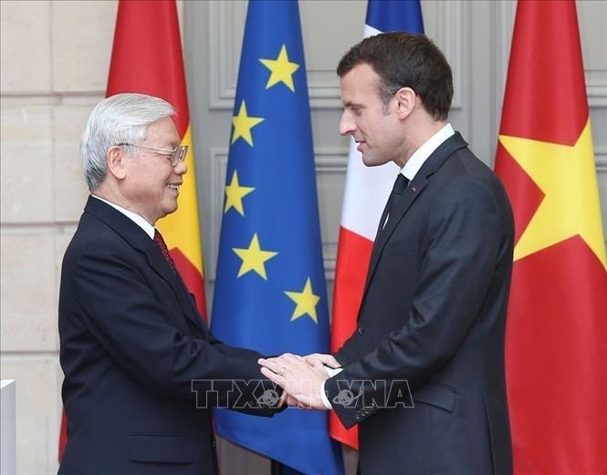 Tổng thống Emmanuel Macron đón Tổng Bí thư Nguyễn Phú Trọng thăm chính thức Cộng hòa Pháp (Paris, 27-3-2018). Ảnh: Trí Dũng/TTXVN