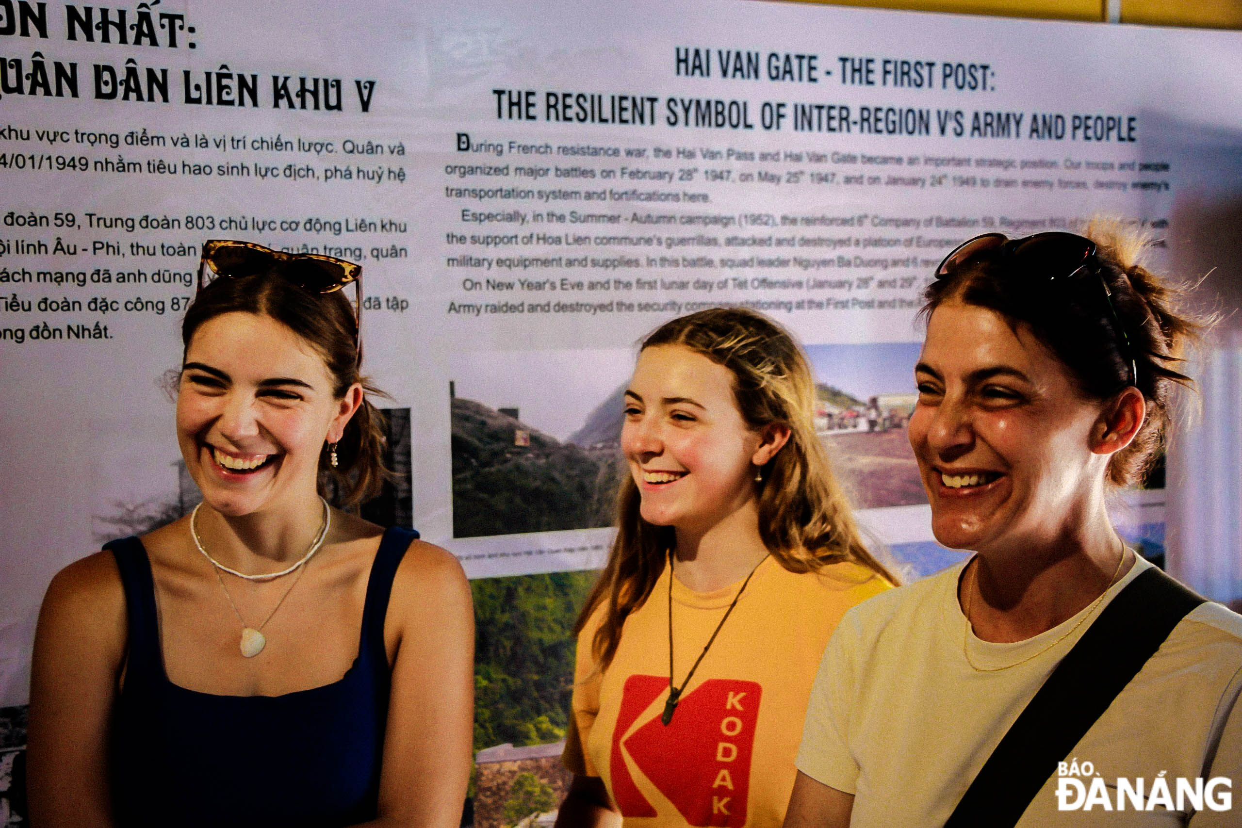 Foreign tourists showing their excitement in the Hai Van Gate