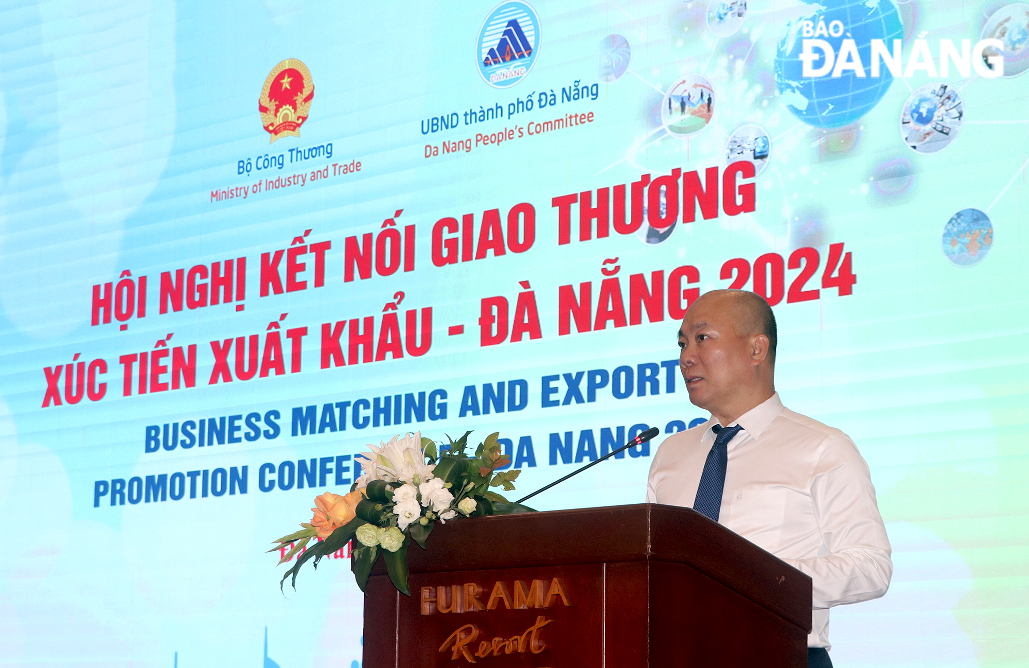 Mr. Vu Ba Phu, General Director of the Viet Nam Trade Promotion Agency under the Ministry of Industry and Trade speaking at the conference. Photo: V.H - M.Q