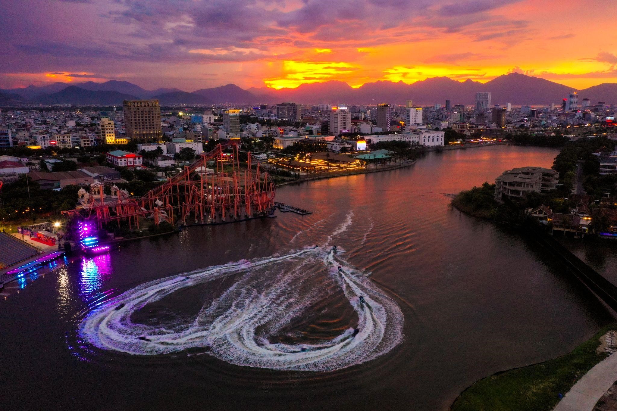 Romantic water display by Jetski athletes in the Awaken River show.