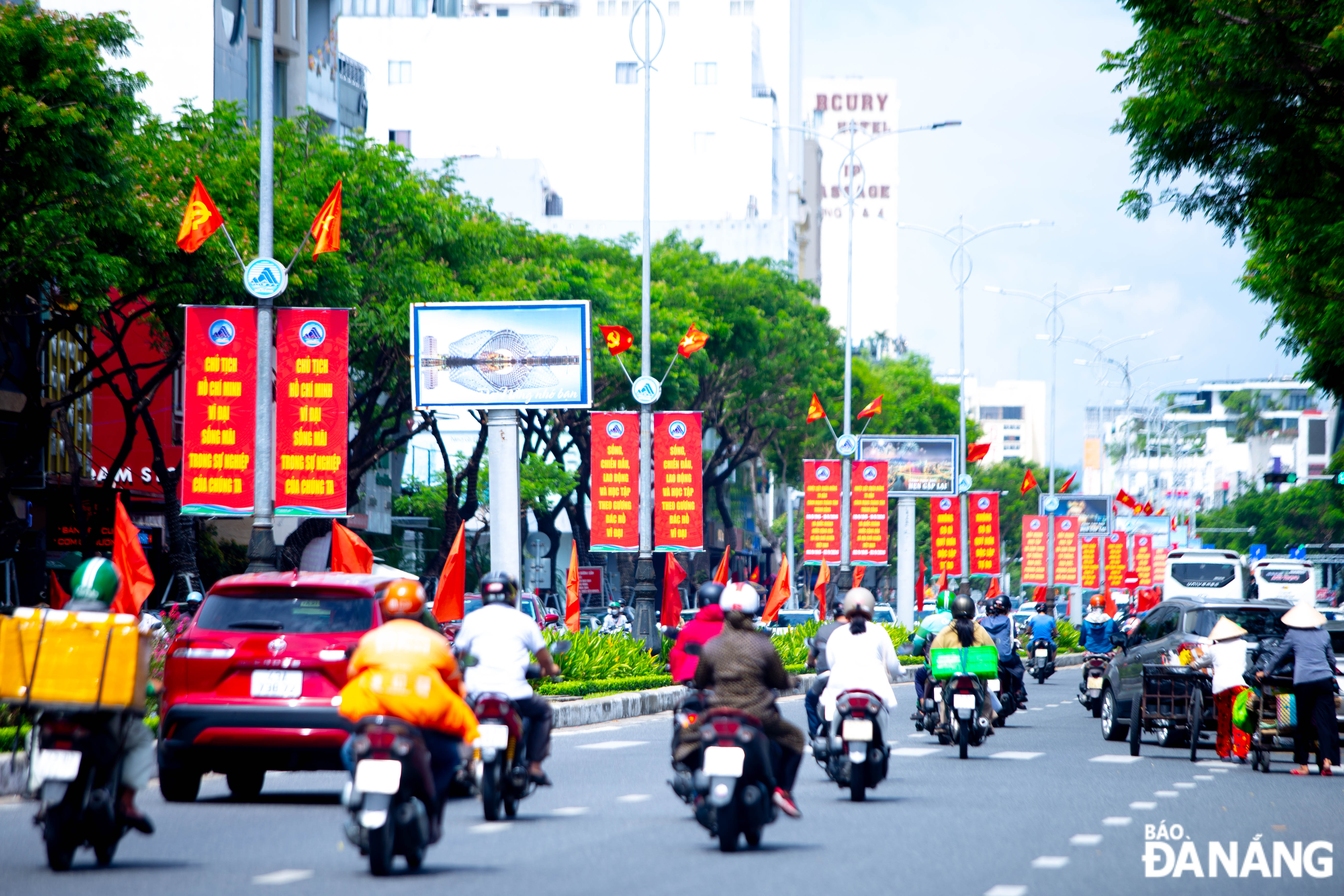 Banners celebrating the 79th anniversary of the August Revolution and National Day on downtown streets