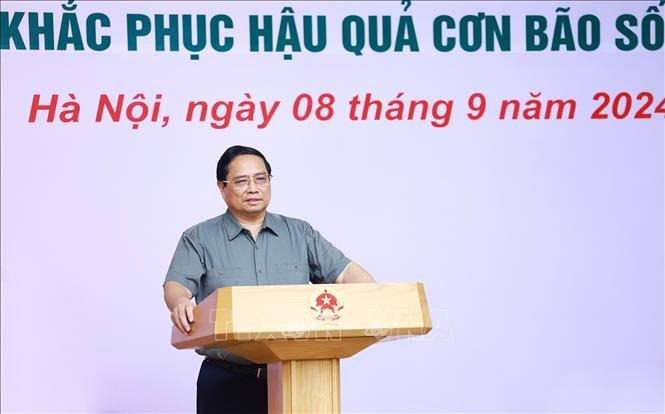 Thủ tướng chủ trì hội nghị đánh giá thiệt hại và khắc phục hậu quả cơn bão số 3. Ảnh: Dương Giang/TTXVN