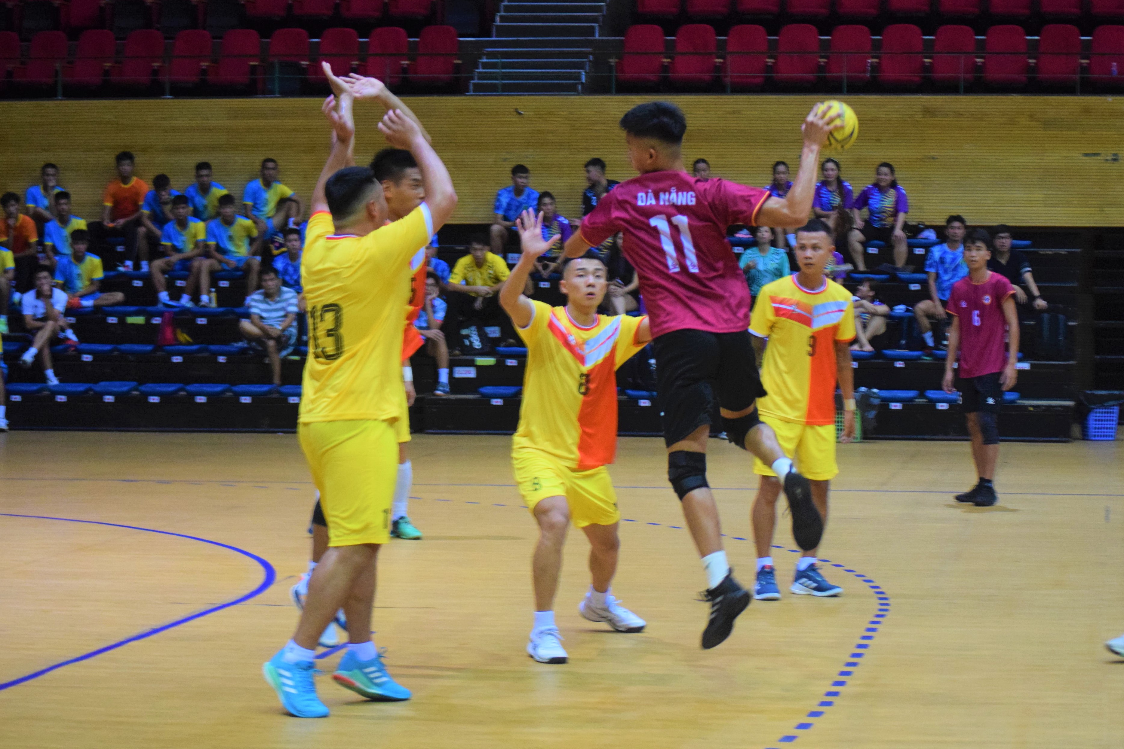 An action shot from the handball match. Photo: P.N