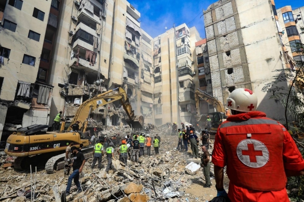 Hiện trường vụ không kích của Israel nhằm vào vùng ngoại ô phía nam Beirut ngày 21-9. Ảnh: AFP-JIJI	