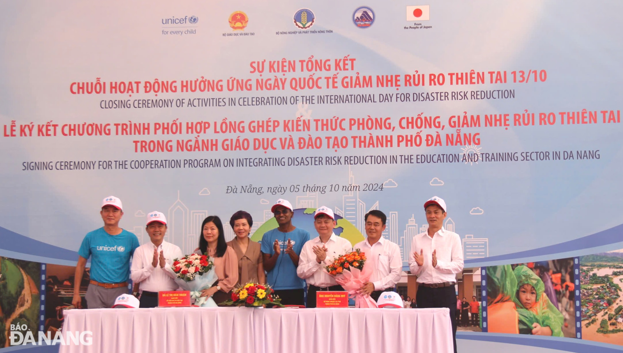 Representatives of the Ministry of Agriculture and Rural Development, the Ministry of Education and Training, and the United Nations Children's Fund (UNICEF) in Viet Nam witnessed the signing of a cooperation programme on integrating knowledge on natural disaster prevention, response, and mitigation in the Da Nang education and training sector's educational programmes for the 2024-2029 period. Photo: HOANG HIEP