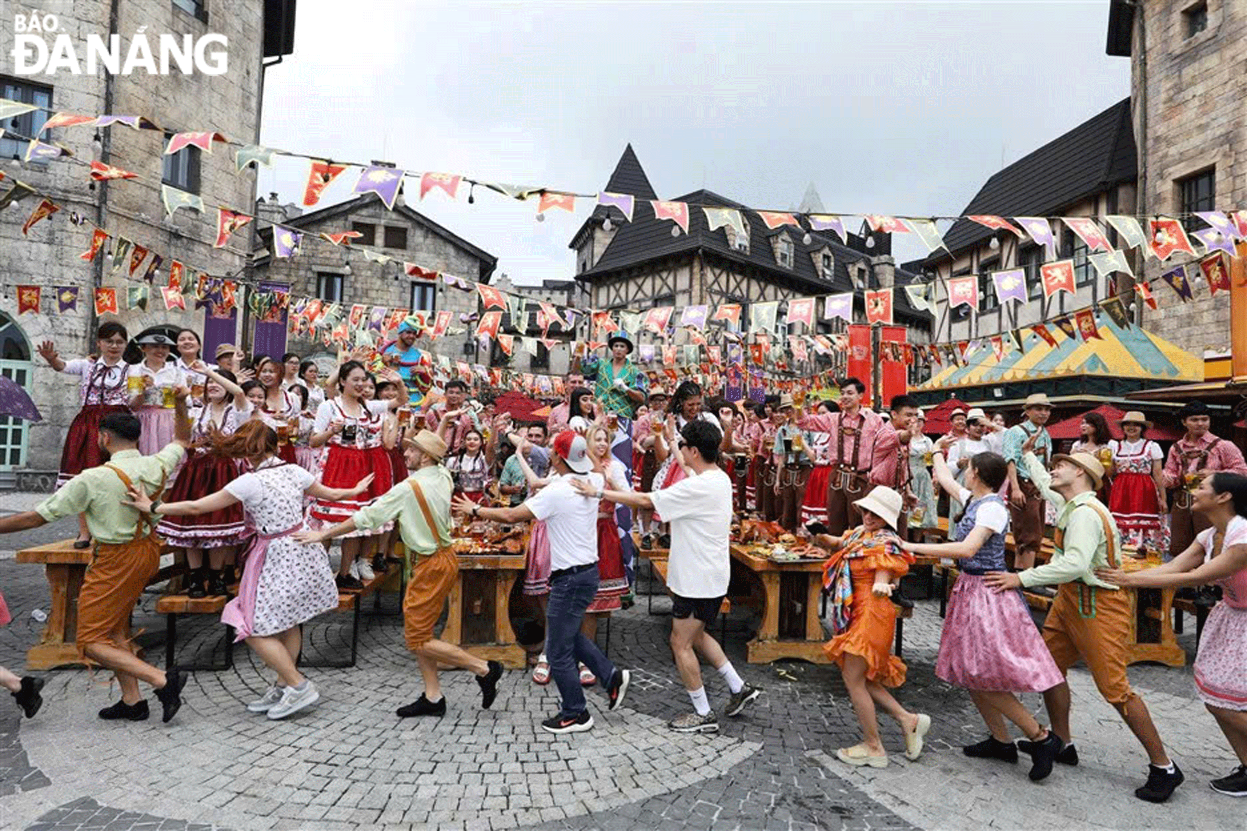 Tourists experience a festival programme at Sun World Ba Na Hills Tourist Area. Photo: THU HA