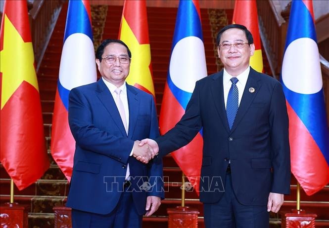 Thủ tướng Phạm Minh Chính hội kiến Thủ tướng Lào Sonexay Siphandone, Chủ tịch ASEAN 2024. Ảnh: Dương Giang/TTXVN