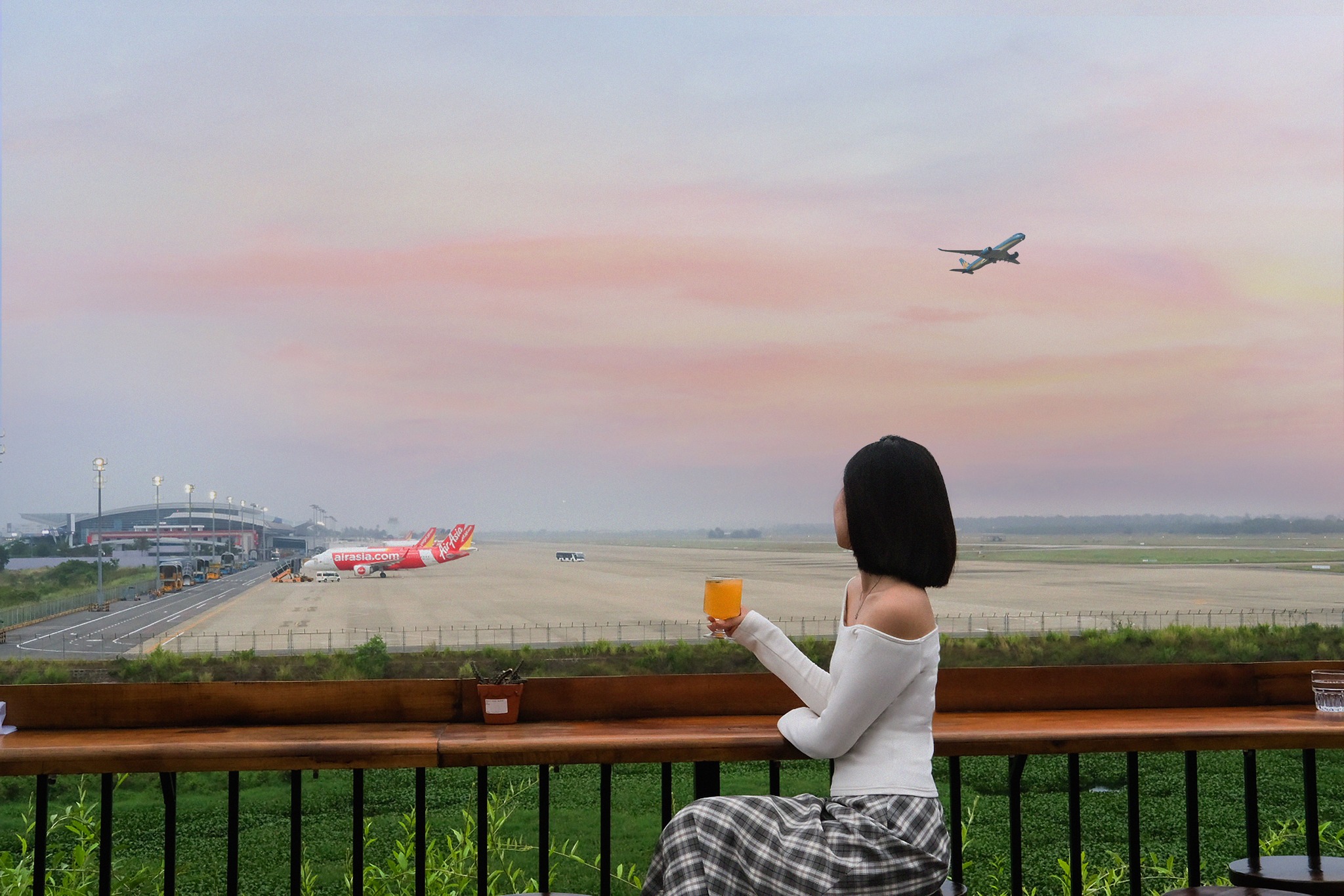 Visitors watch flights from the Rooftop. Photo: H.L