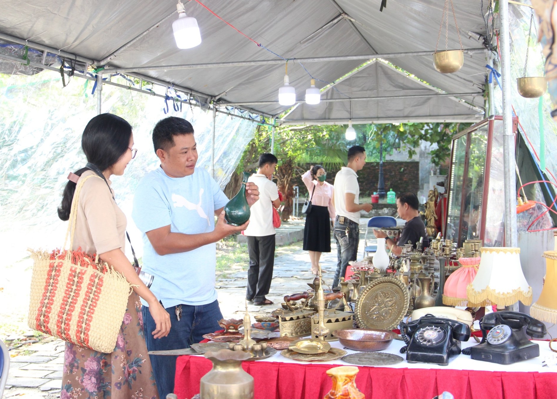 Tourists visit the Da Nang Antique Market at the Museum of Da Nang