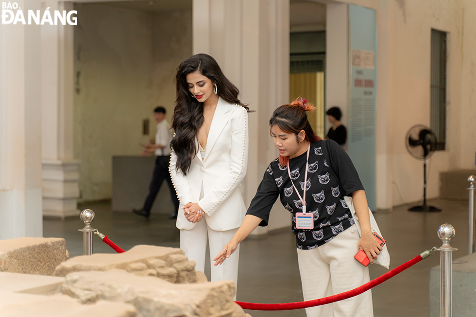 Miss Universe India Rhea Singha learning about culture at the Da Nang Museum of Cham Sculpture.