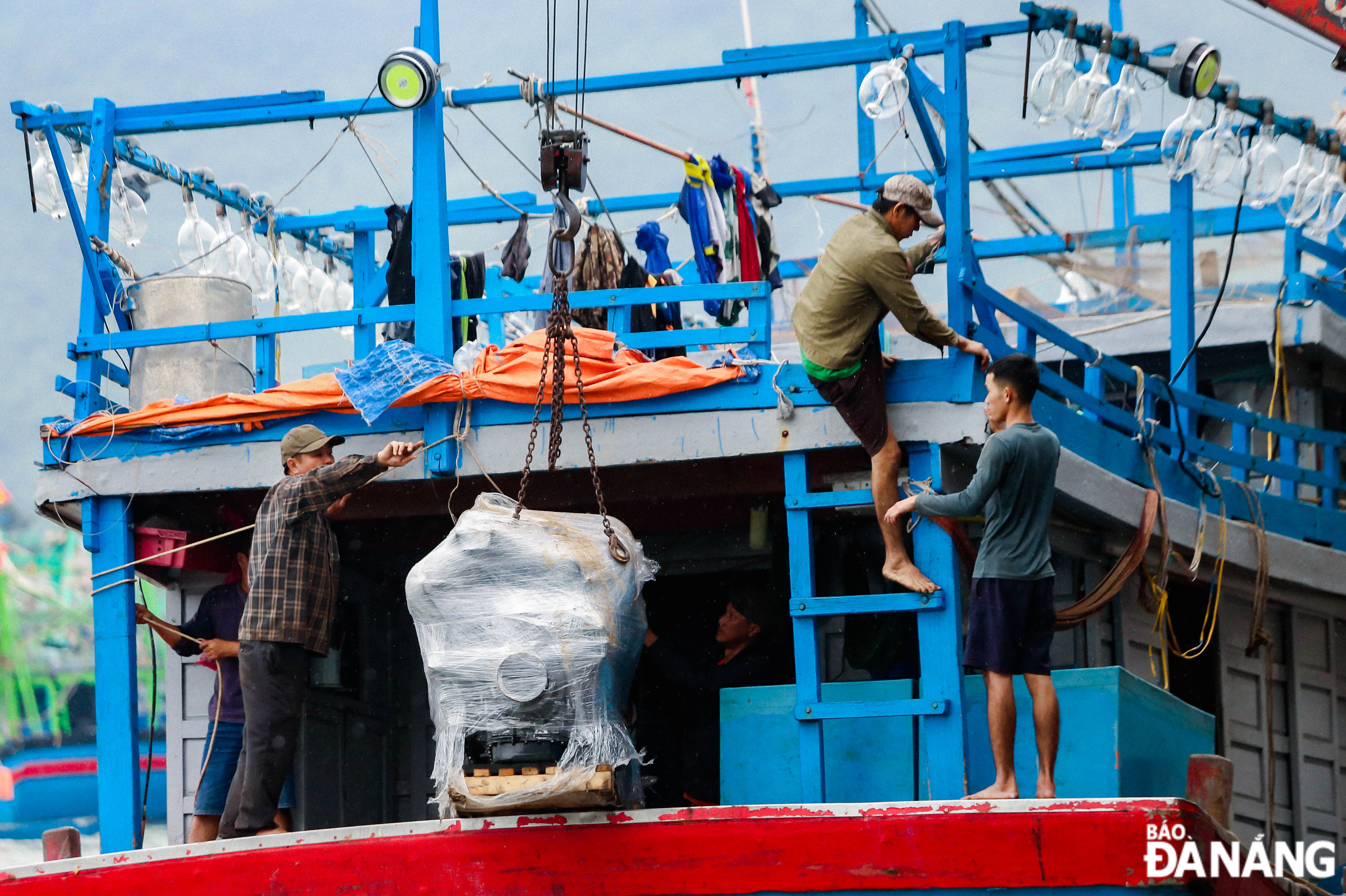 Machinery and equipment were transported by fishermen to safer areas to avoid storm.