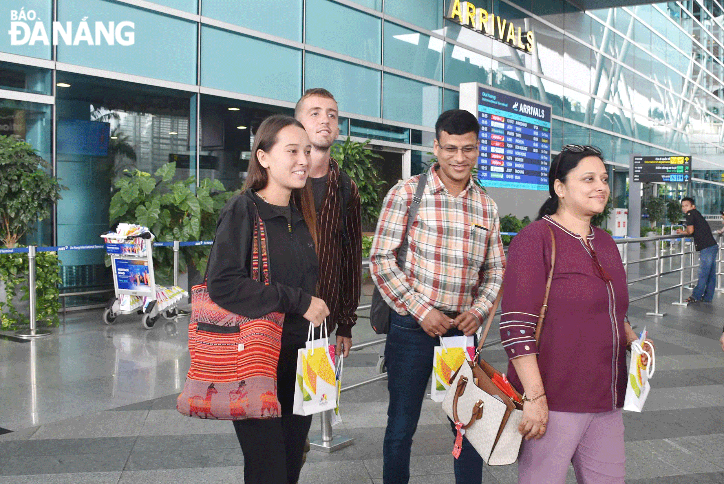 Indian tourists arrive at the Da Nang International Airport. Photo: THU HA