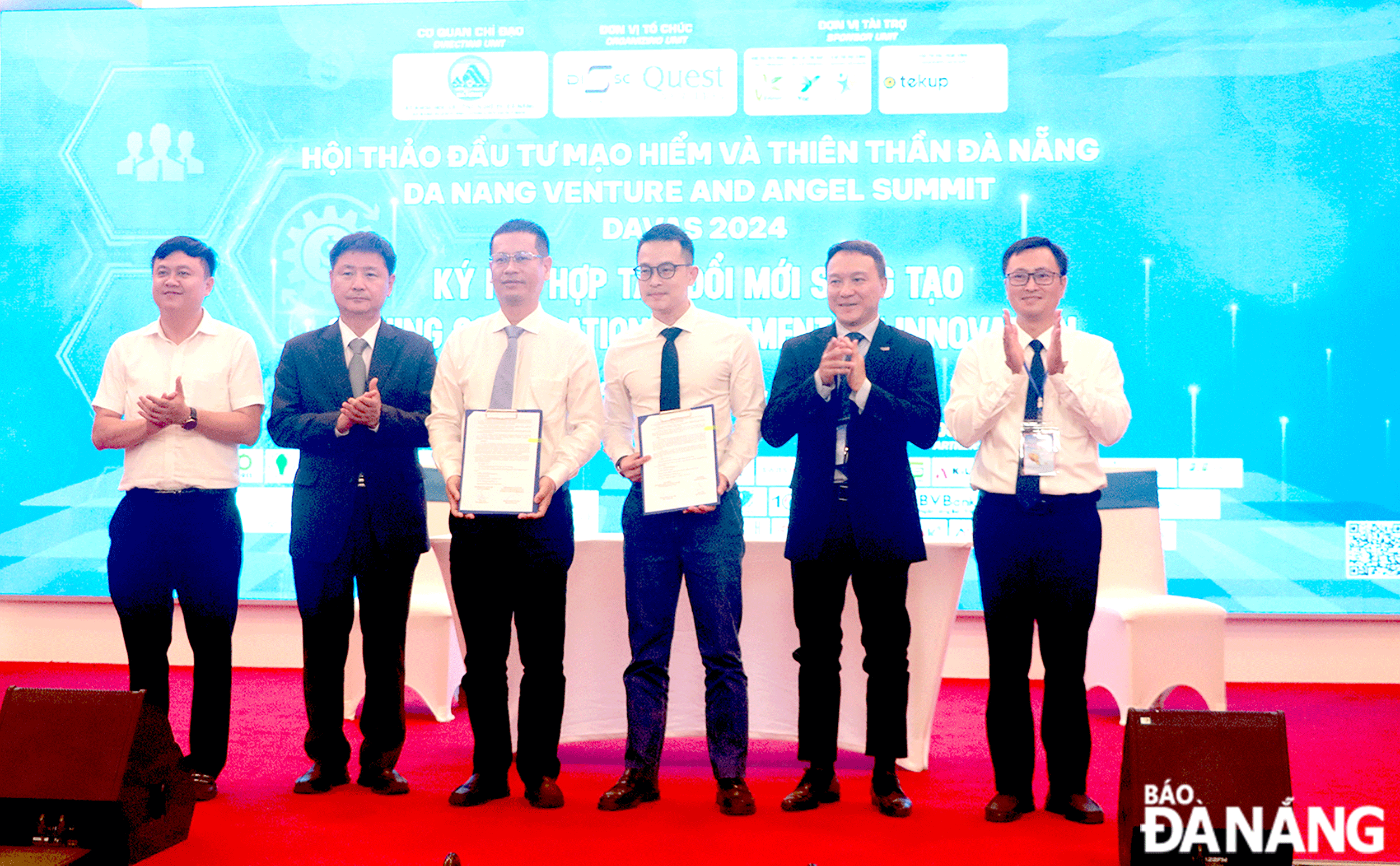 Da Nang has been implementing many policies to support and promote the innovative startup ecosystem. Here is a scene of signing an innovation cooperation agreement at DAVAS 2024. Photo: VAN HOANG