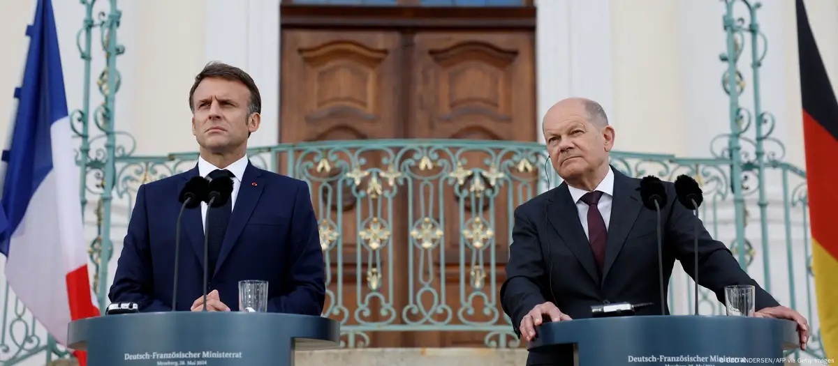 Thủ tướng Đức Olaf Scholz (bên phải) và Tổng thống Pháp Emmanuel Macron trong cuộc họp báo chung ở Meseberg, Đức, ngày 28-5. Ảnh: AFP