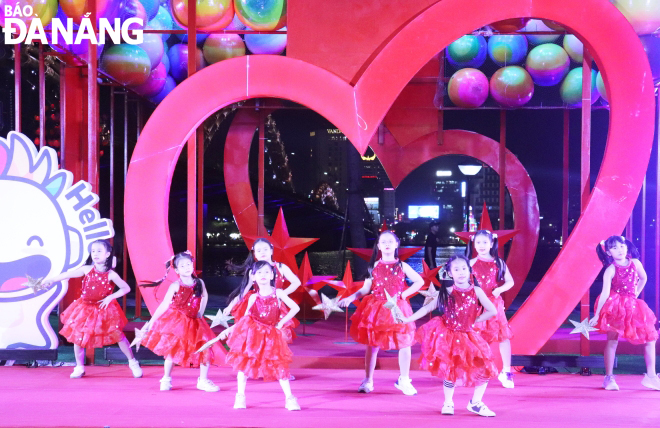 An exciting art performance by children at the opening ceremony of the festival