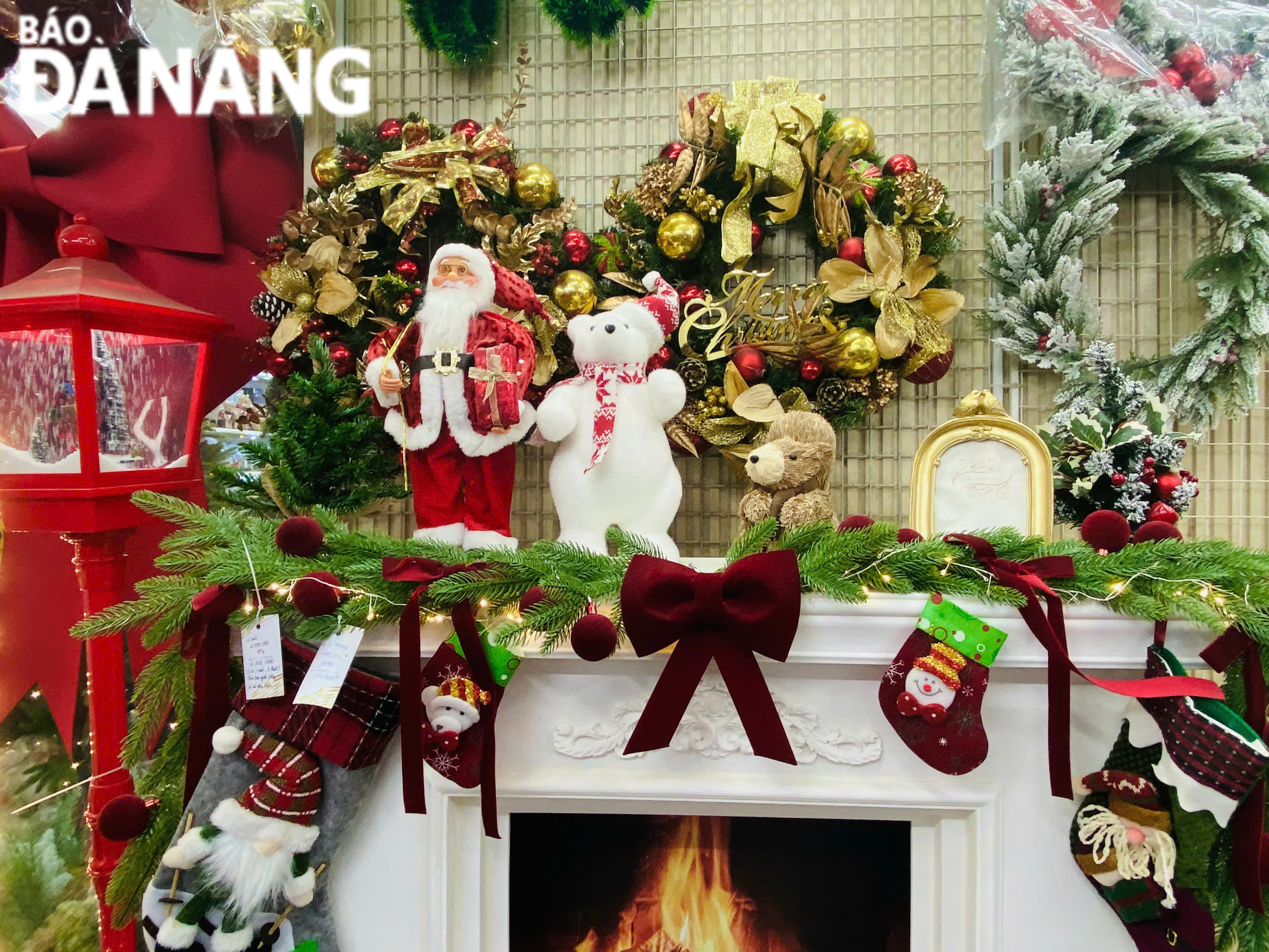 Stores display a variety of Christmas items for customers to browse. Photo: MAI LY