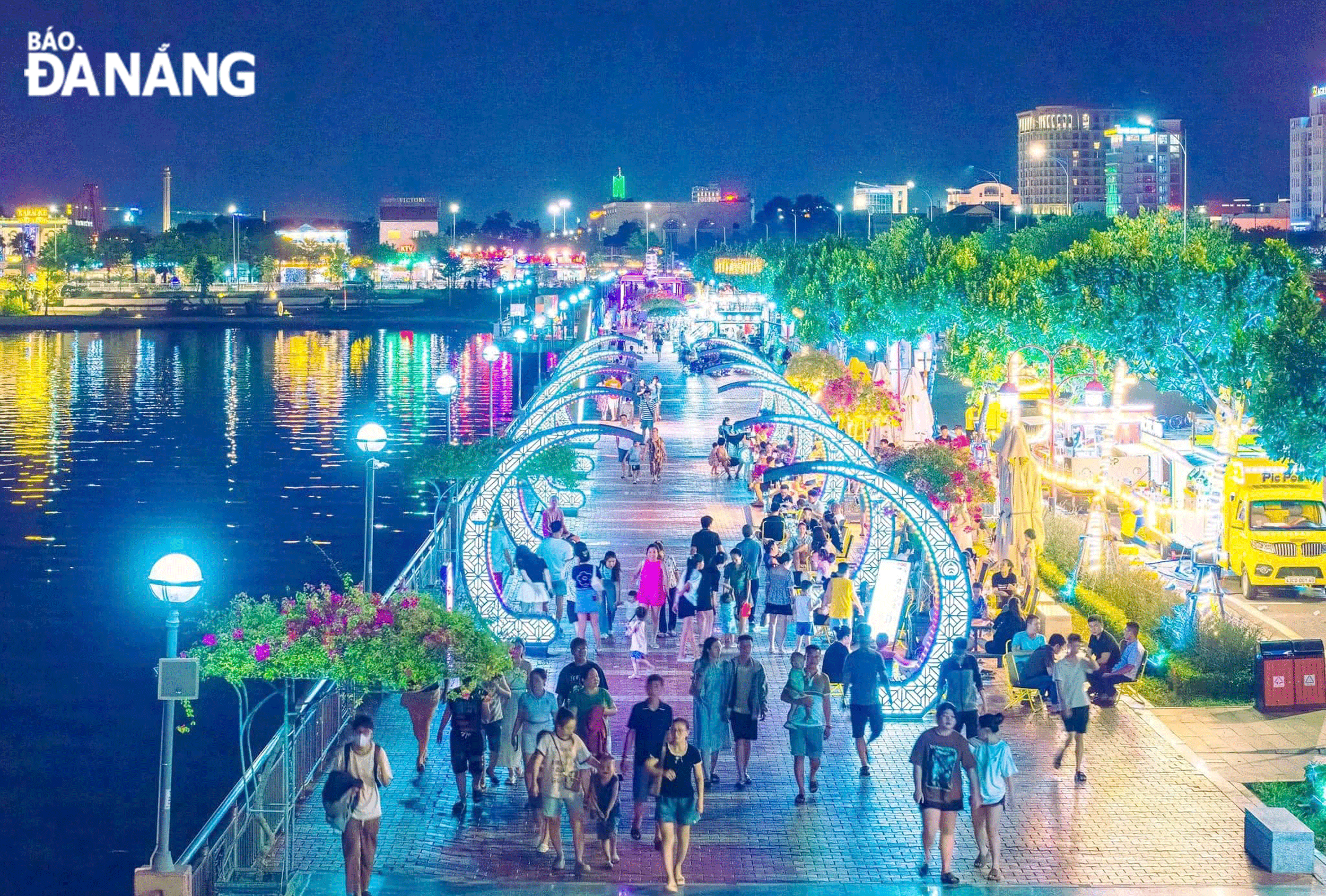 Tourists going for a stroll along Bach Dang Street. Photo: GIA MINH