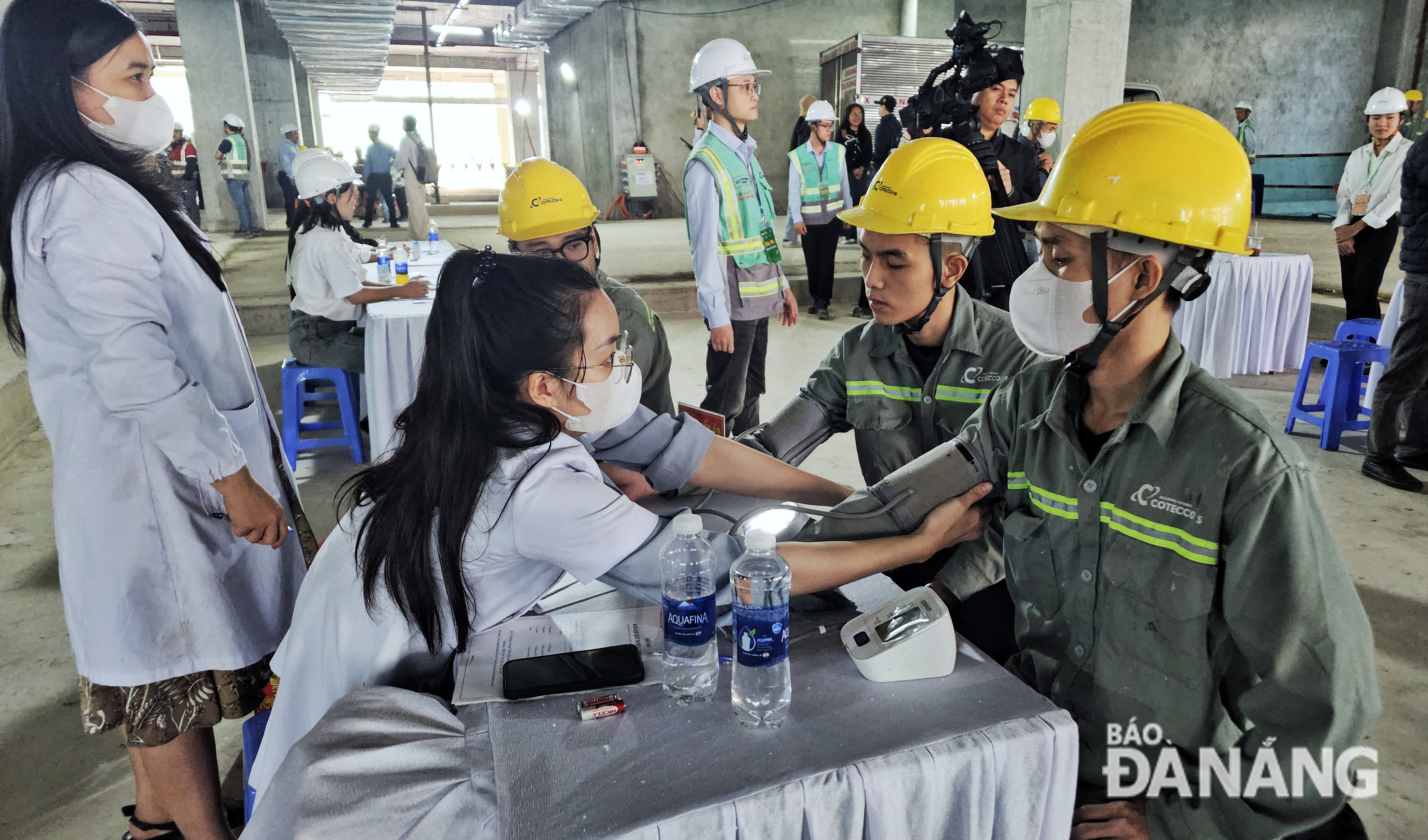 Workers receiving free health check-ups. Photo: L.P